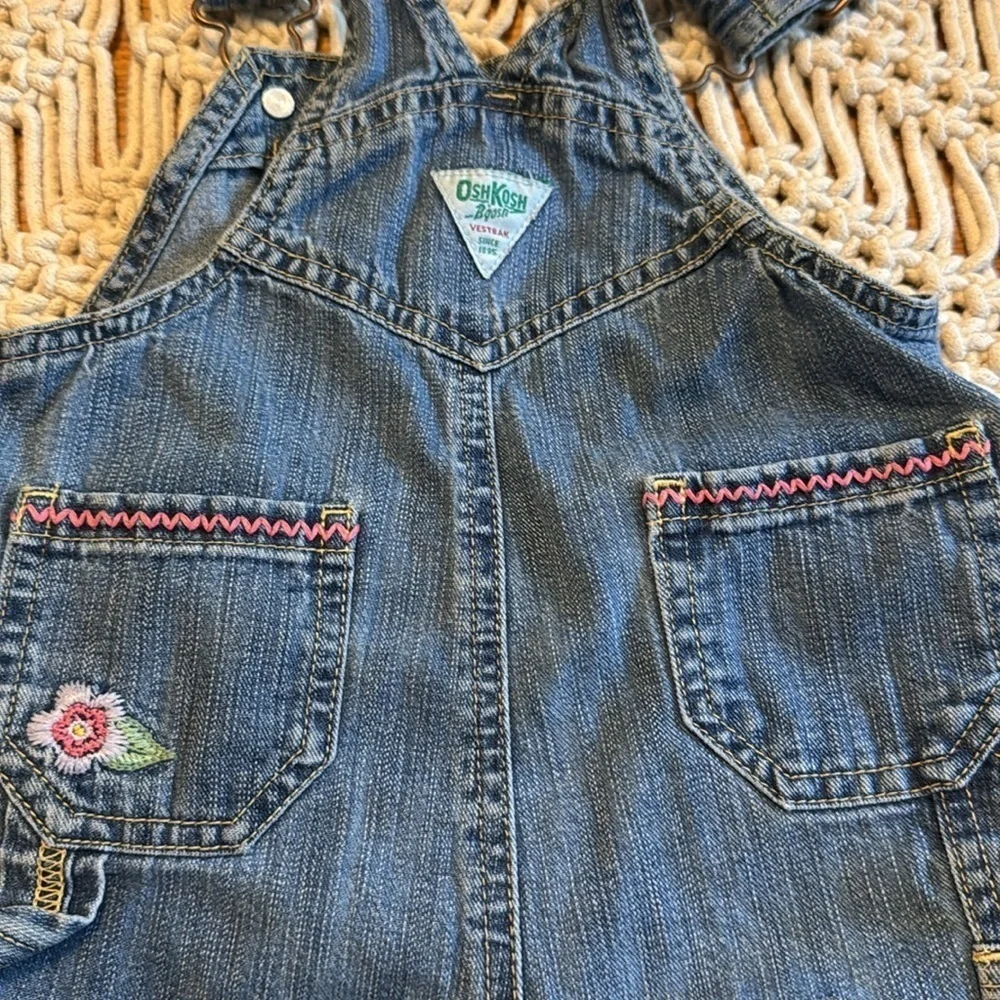 OshKosh B'gosh Blue Denim bib Overalls Embroidered pink flowers‎ size 6/9 months